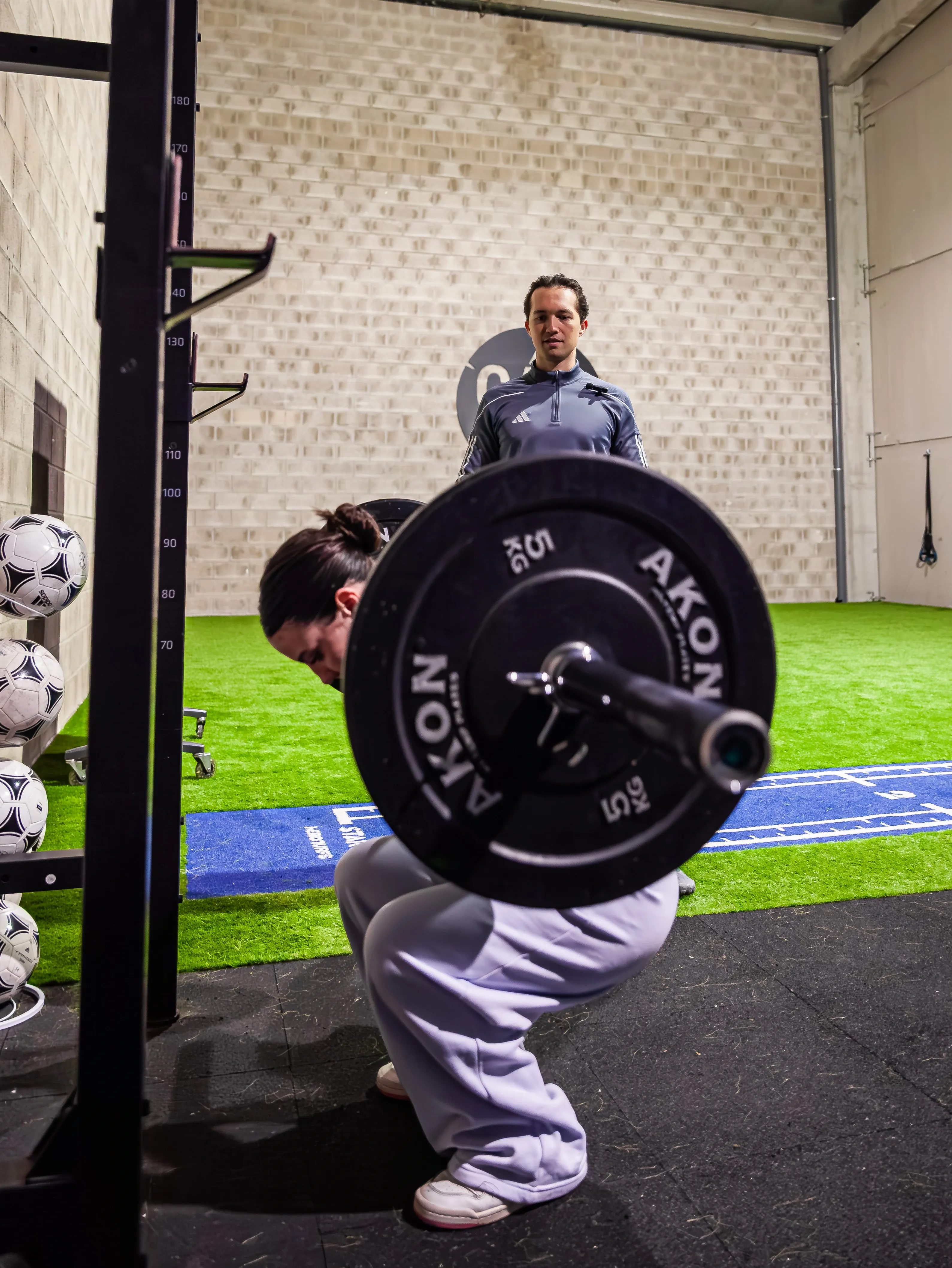 Entrenamiento de sentadillas con barra en CAR RIVAS